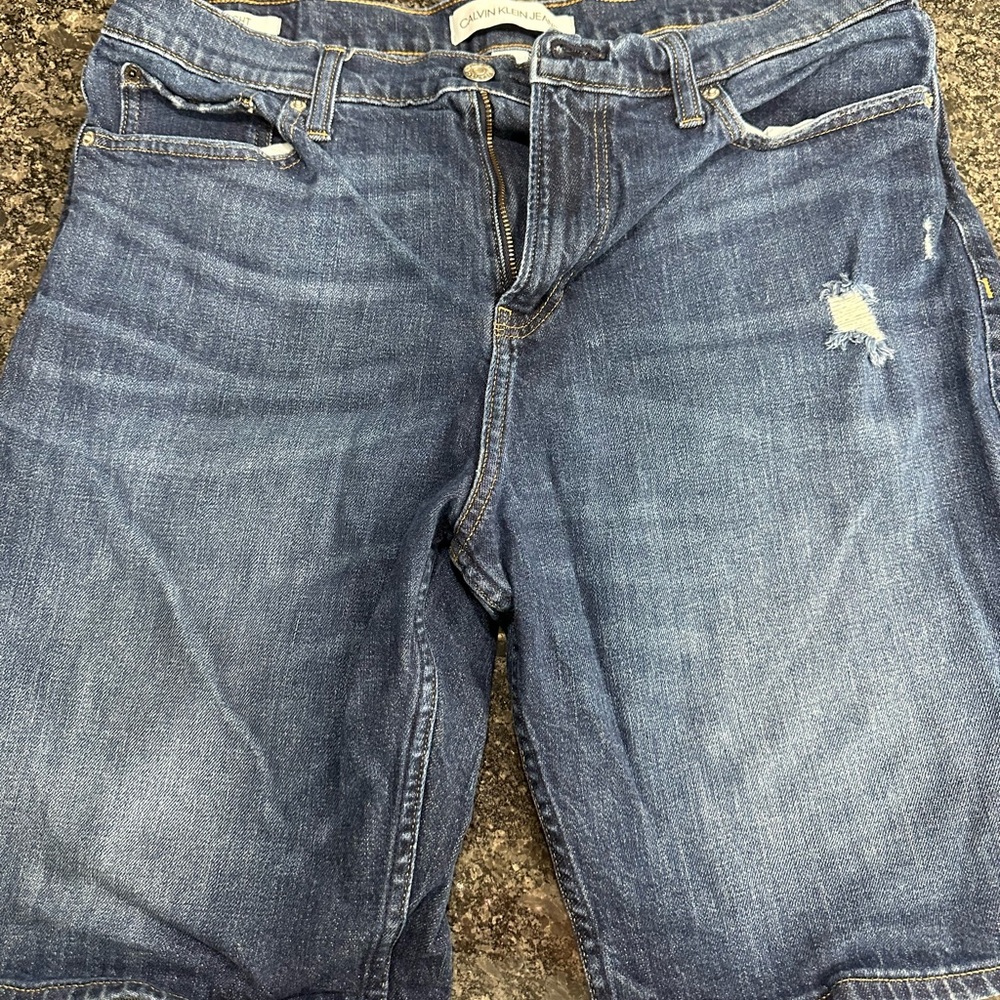 Calvin Klein men's denim shorts. Size 34. 9" inseam.I have three identical pair!